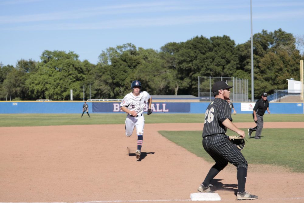 American River College outfielder Ian McIsaac runs to third base off a hit. ARC lost to San Joaquin Delta College 11-2 at ARC on April 12, 2019. (Photo by Hameed Zargry)
