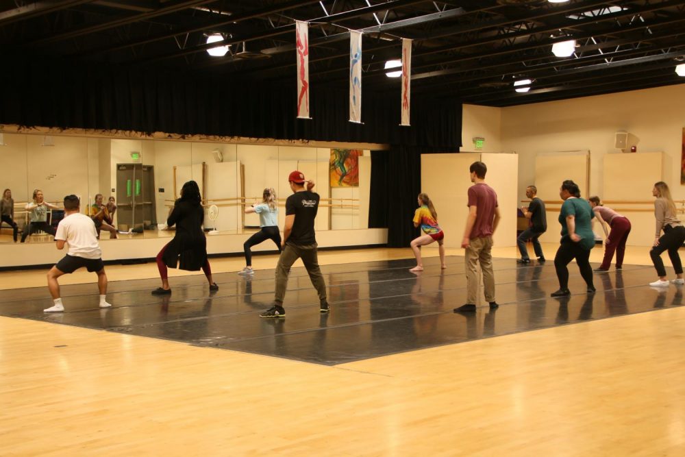 An American River College dance class practices to Ariana Grande’s song “Break Free” in the gym at ARC on April 23, 2019. (Photo by Emily Mello)