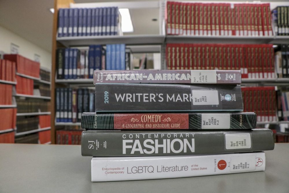 The American River College library is currently seeking to make textbooks and materials such as these available to students at a zero or reduced cost. (Photo illustration by Irene Jacobs)