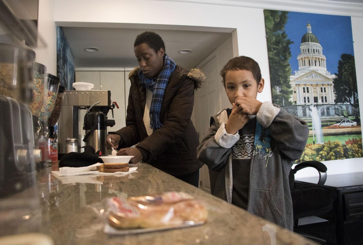 Duren-Hill and Gavin head down to have breakfast provided by their motel Americas Best Value Inn in Sacramento, Calif. on Jan. 3, 2019. (Photo by Ashley Hayes-Stone)