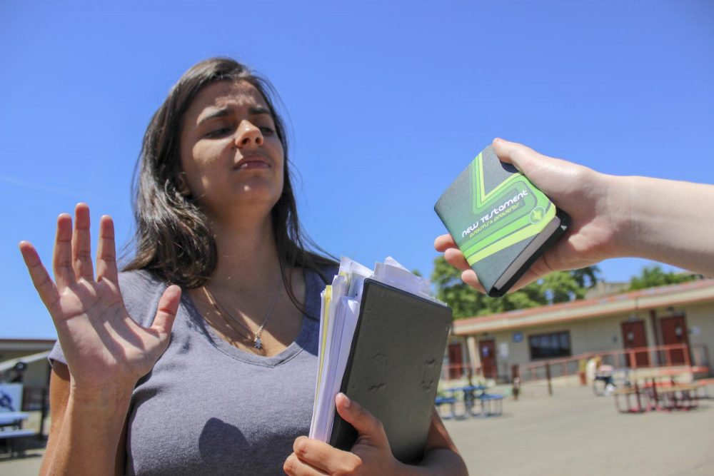 Religious protesting on campus may grab attention at first, but this method of evangelism can be frightening and turn people away. (photo illustration by Ariel Caspar)