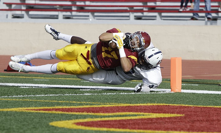 Former ARC linebacker Lawerence Hall stops a Sacramento City College player from scoring a touchdown during last seasons game on Nov. 15, 2014. ARC won the game 44-23 and must win the game Saturday to have any chance of making the playoffs. (File Photo)