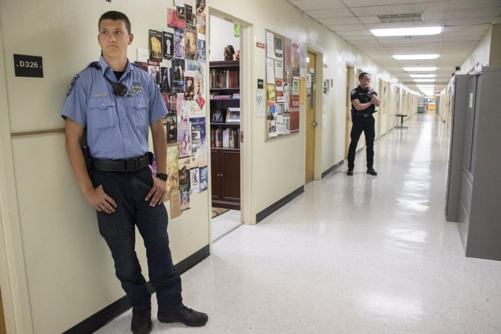 Campus patrol officer Giovani Spinazze and Los Rios Community College officer Joe Quirarte patrol the hallways of Davies Hall during Calif. Governor Gavin Newsom visit to American River College on May 1, 2019. (Photo by Ashley Hayes-Stone) 