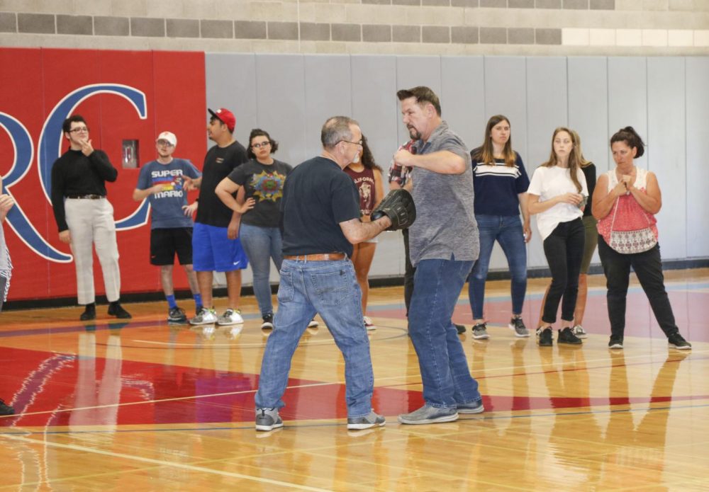 Instructor Joe Sjolund teaches a personal safety class in the American River College main gym on Aug. 29, 2019. (Photo by Emily Mello) 