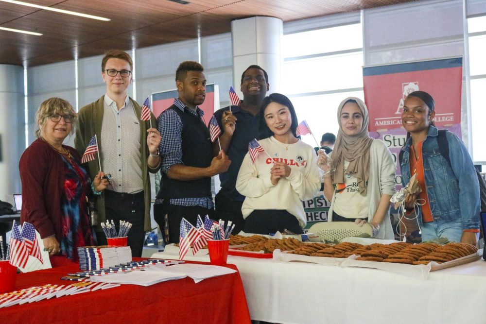 For Constitution Day, the Associate Student Body Senate lead by Student Senate President Aesha Abduljabbar, handed out fresh baked cookies and mini copies of the Constitution to passing students in the Student Center on Sept. 17. (Photo by Ariel Caspar)