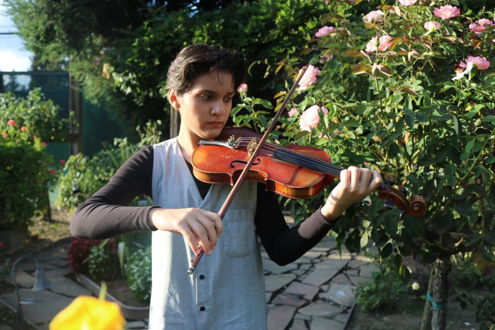 Lida Haphar, biochem and molecular biology major, has been playing the violin since she was 6-years-old and in the last year she has competed in the Crescendo International Music Competition at Carnegie Hall in New York City. (Photo by Emily Mello) 
