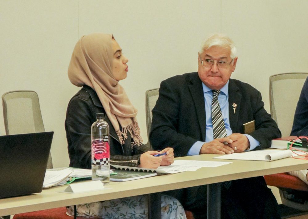 President Aesha Abduljabbar (left) addresses the Student Senate meeting agenda with Parliamentarian Lorenzo Cuesta (right) at American River College on Oct. 4 , 2019. 

