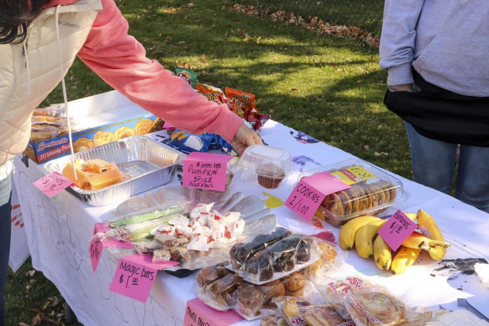 The Child Development Center holds a bake sale once a semester to raise money for food and supplies for the classroom pets such as guinea pigs and fish, as well as outdoor chickens at American River College on Oct. 30, 2019. Majority of the baked goods were supplied by the parents as well as staff members. (Photo by Oden Taylor)  
