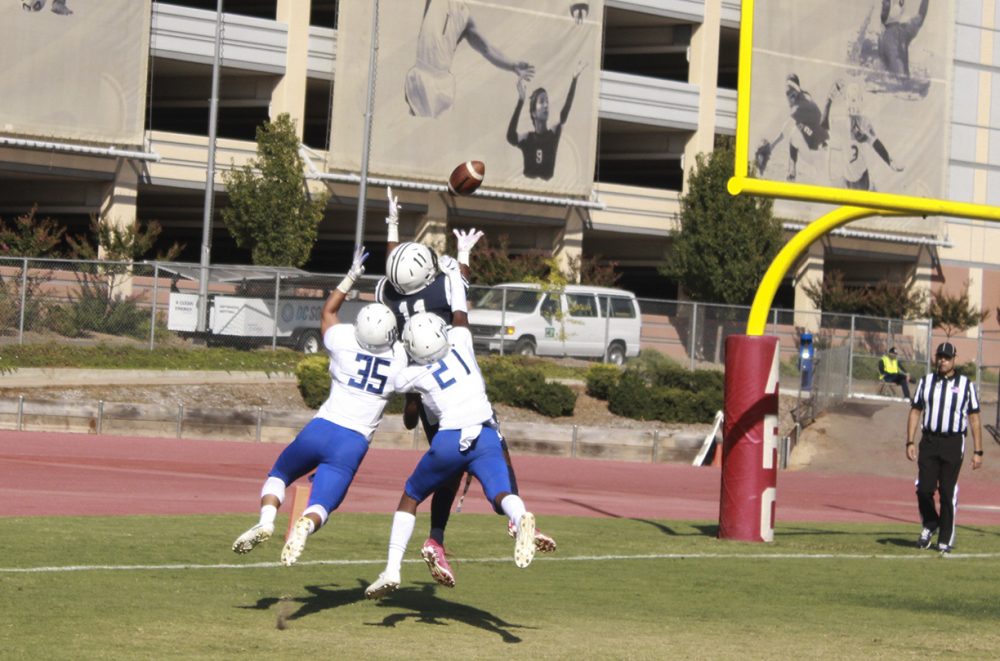 American River College’s wide receiver, Naequan Parker goes for a crucial touchdown to help his team get on the scoreboard in the game against Modesto Junior College on Sept. 28, 2019. ARC lost the game 38-20. (Photo by Brandon Zamora)