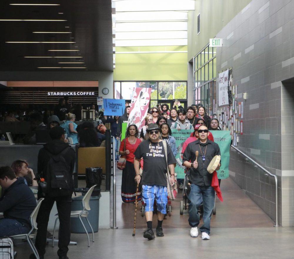 Members and friends of the Native American community celebrate Indigenous Peoples Day, a response to Columbus Day in the Student Center at American River College on Oct. 14, 2019 (Photo by Jack Harris)