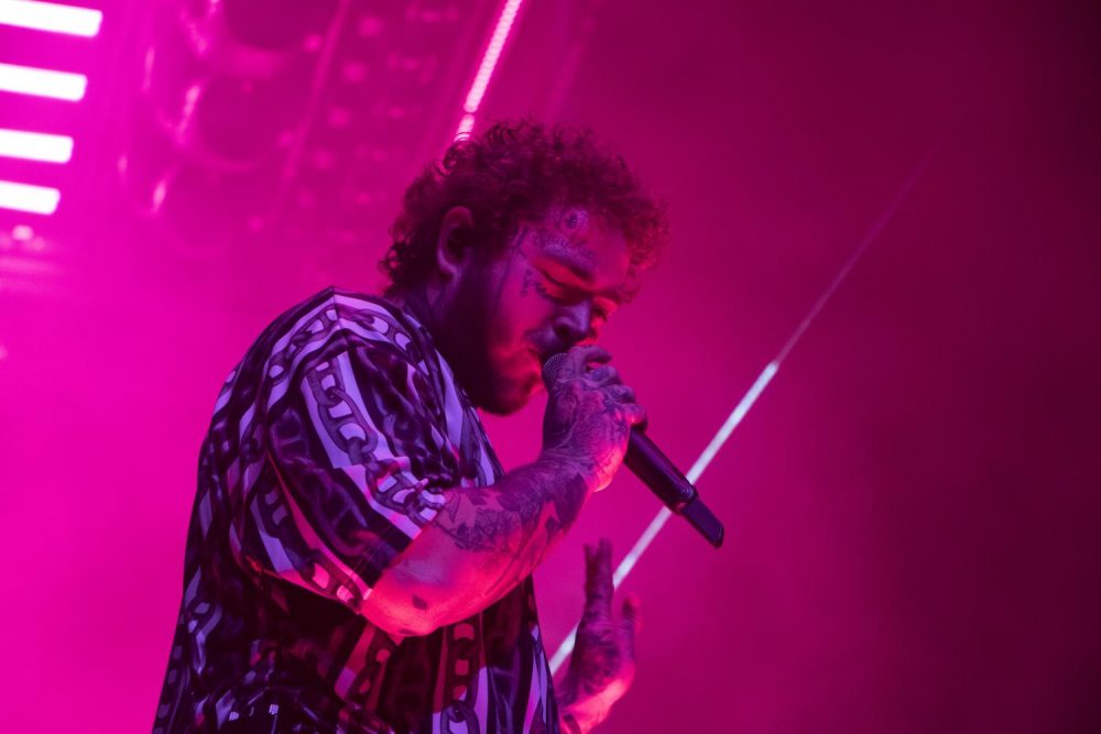 Rapper+Post+Malone+performs+at+the+Golden+1+Center+during+his+Runaway+Tour+in+Sacramento%2C+California+on+Sept.+19%2C+2019.+The+tour+coincides+with+his+wildly+successful+latest+album%2C+%E2%80%9CHollywood%E2%80%99s+Bleeding%2C%E2%80%9D+which+marks+a+departure+from+his+earlier+music.+%28Photo+by+Ashley+Hayes-Stone%29