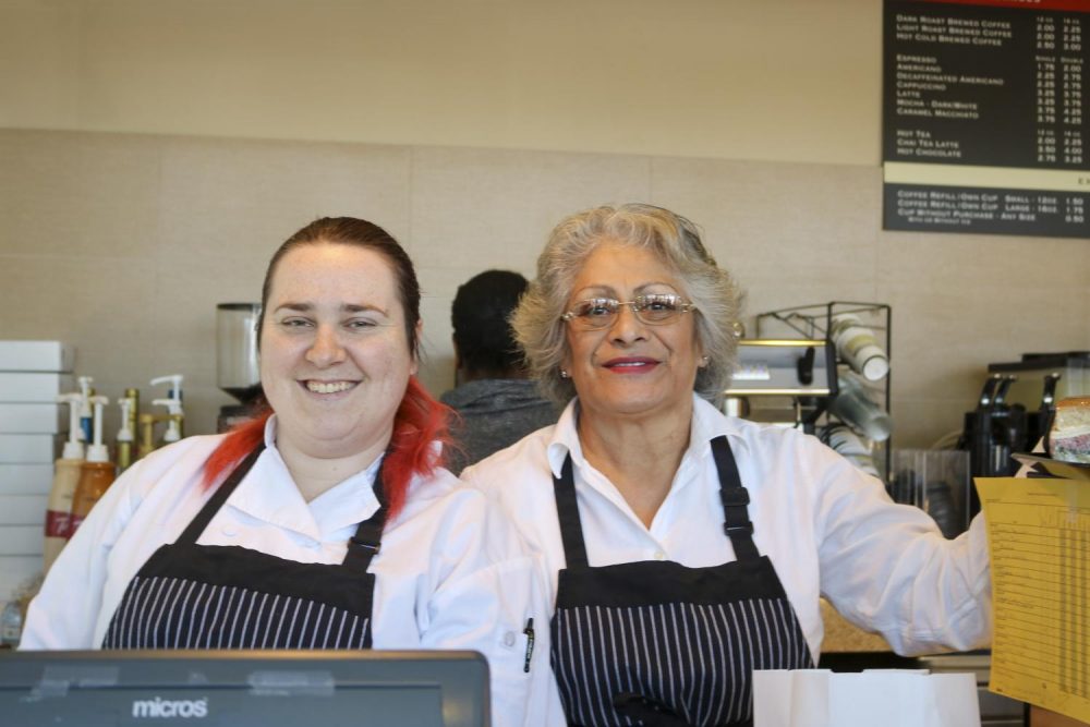 Culinary majors Terra Tucker and Mary Oliza serves customers during the opening day at Oak Cafe at American River College on Feb. 12 , 2020. (Photo by Marquala Brown) 
