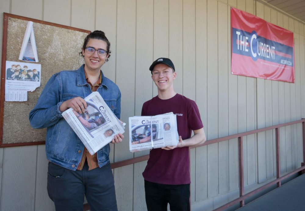 The Current’s opinion editor Colin Bartley and staff writer Alex Muegge get ready to distribute the paper at American River College on Feb.19,  2020. (Photo by Emily Mello)
 