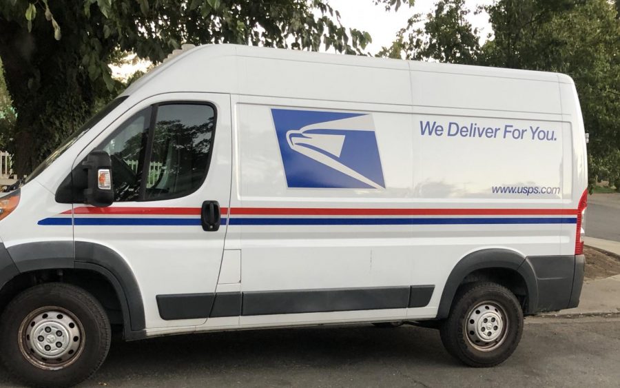  A USPS van is parked in Sacramento, CA with the words written “We deliver for you” on its side on Tuesday, October 20, 2020. The federal agency has come under attack with budget cuts by the Trump administration, politically aimed to stop mail-in voting. The agency is currently facing an influx of mail-in voting because of COVID-19. This is as Americans and congress are working to save the struggling agency. (Photo by Irvis Orozco)