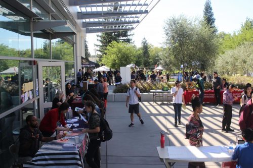 Students gather on club day prior to the COVID-19 pandemic in the fall semster of 2019 at American River College. ARC and other Los Rios Community College District  schools have seen a significant decrease in student enrollment from the spring 2021 semester to the spring semester of 2022, due to complications from the pandemic. (File Photo) 