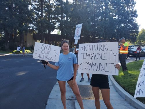 Emily Cowan, an American River College language studies major and tennis player protests, among other students, against the Los Rios Community College District COVID-19 vaccine mandate on Sept. 30, 2021. (Photo by Lorraine Barron)