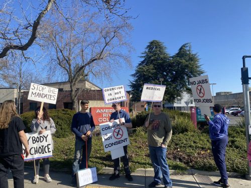 On Jan. 26, members of the American River College community met in front of the ARC campus to protest against the Los Rios Community College Districts COVID-19 vaccine mandate. (Photo by Alyssa Branum)