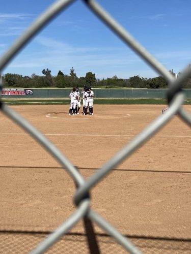 The American River softball team is pushing hard and working together as a team to continue their season to the Big 8 conference, in the spring semester of 2022. (Photo by Maya Barber)