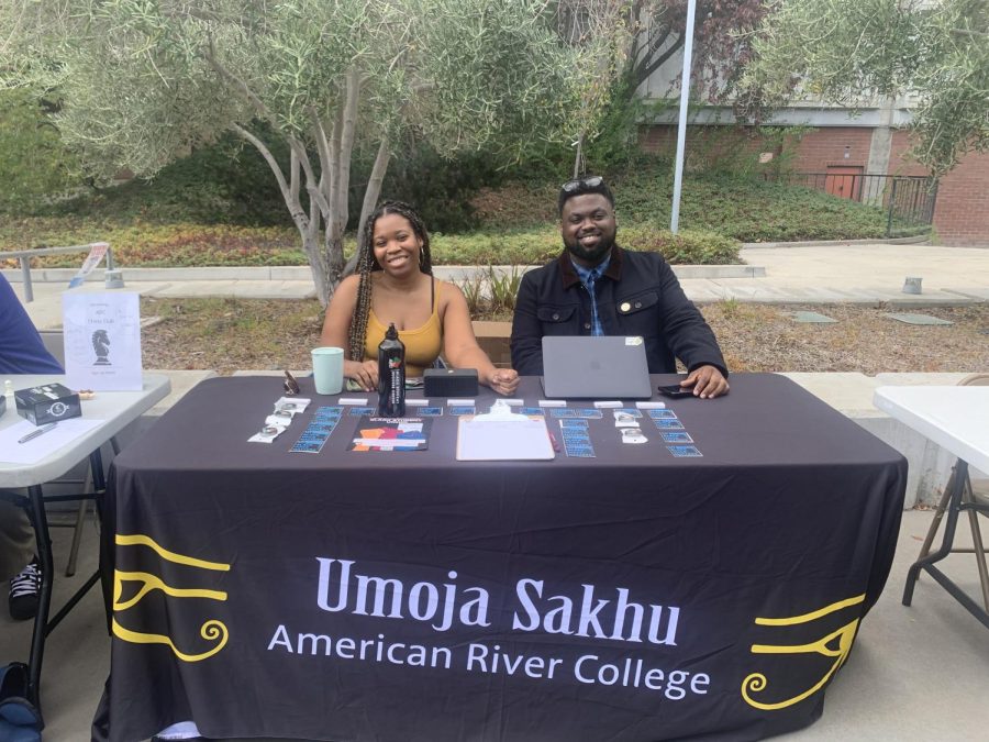 American+River+College+alumni+and+Secretary+of+Black+Student+Union+Ashlee+Green+and+Co-Advisor+Denzel+Phoenix+are+pictured+at+the+Club+Rush%2C+which+took+place+on+Tuesday+Sept.+20+in+front+of+the+Student+Center+on+the+main+campus.+Representing+the+Umoja+Sakhu+club%2C+also+known+as+Black+Student+Union.%0A%0AWhat+are+they+all+about%3F+Secretary+Green+said%E2%80%9C+The+club+centers+around+blackness+within+the+ARC+campus.+%5BThe+club%5D+helps+students+identify+and+learn+more+about+the+culture+themselves+and+be+exposed+to+more+black+culture+within+academia.%E2%80%9D%0A