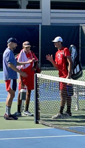 Bobak Jabery-Madison, American River Colleges men’s head tennis coach, meets with doubles partners, Ravi Nelson and Spencer Hill, after they defeated Bakersfield College in the final at the Intercollegiate Tennis Association tournament at ARC. (Photo by Gina Gangursky)