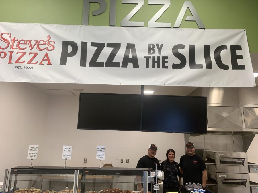 Steves Pizza owner Rodney Ibanez and workers, Yesenia Delgado, and Jose Estrada are shown in the picture as they celebrate their first day serving American River College on Tuesday, Sept. 27 (Photo by Jonathon Plazola)