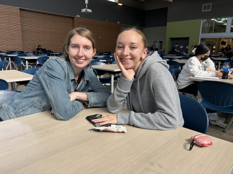 American River College students Angelina Dunn-Byrom and Ejley McKenry take a break in the cafeteria. (Photo by Gina Gangursky)