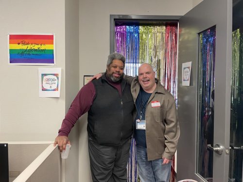 On Jan. 31 the UNITE Center held an open house for the new PRIDE Center, located in the Student Center at ARC. Pictured are Corey Winfield (left), UNITE Center concierge and David Shrove-Austin(right), faculty PRIDE coordinator. (Photo by Jonathan Plazola)