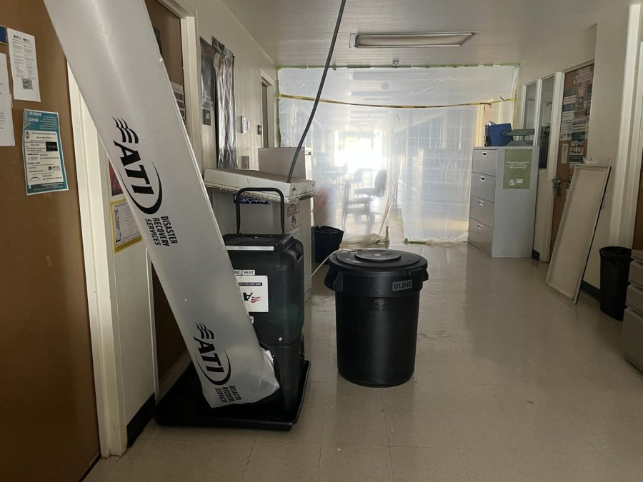 The lower library entrance was not accessible due to a sewage leak in the third floor restroom. (Photo by Heather Amberson)