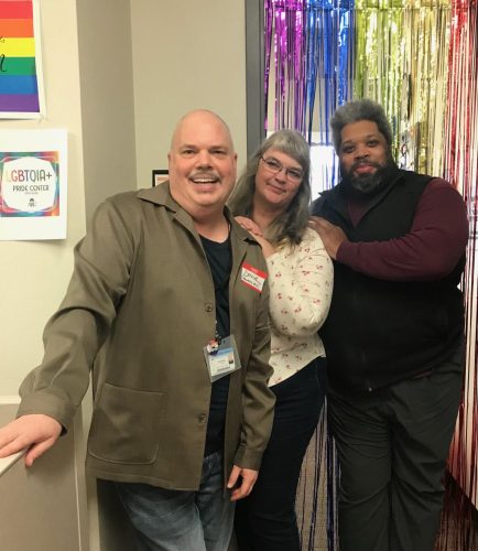 American River College students and staff visited the Pride Center on Jan. 31 to mark its reopening. David Austin, pride center coordinator; Mary Goodall, and UNITE Center Concierge, Corey Winfield pose for a photo. (Photo by Kaitlyn Riley)