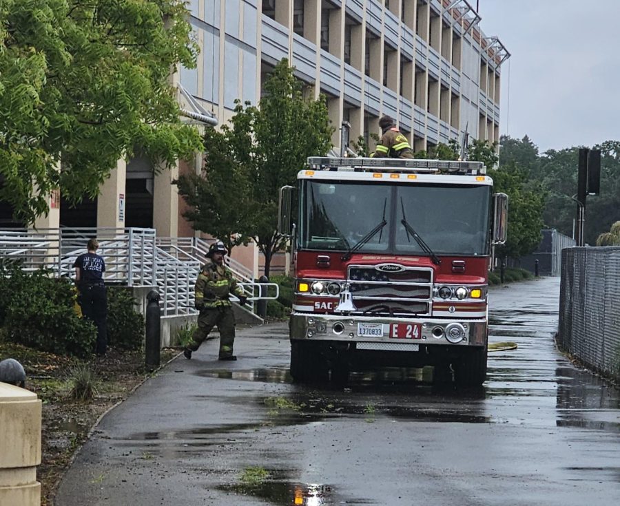 At American River College the local fire department took the opportunity to test a new hose on May 4. They were curious to see its flexibility to uncoil without causing damage to nearby vehicles. (Photo by Katie Vance)