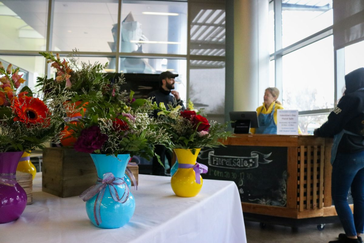Flowers help color the corner in American River College’s Student Center on February 9, 2024. (Photo by Shy Bell)