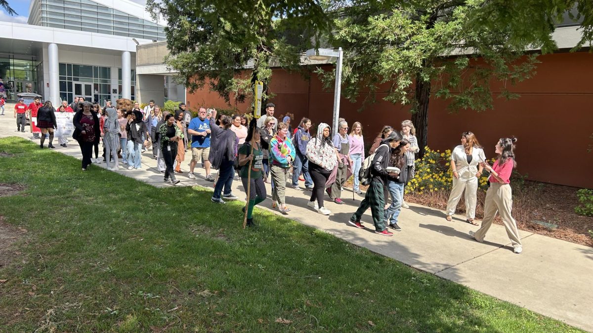 Lindsie Kotcher (right), a full time employee of the Center for Leadership and Development as a Student Support Assistant for Student Life, is seen here leading the Women’s March around the American River College main campus on March 26, 2024. Supporters came out in droves with signs and banners to express their support for women to have free agency over their own bodies. 

Kotcher brought the women’s marches to the campus this year in dedication to the woman leaders of ARC, both among the faculty and the student body. 

“There’s usually a women’s march between February and March, nationally.” Kotcher said. “I thought it would be cool to bring it to American River College.” (Photo by William Forseth)
