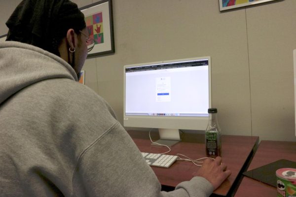 The Okta single sign-on page pops up as an American River College student attempts to log into Canvas on February 20, 2024. (Photo Illustration by Jose Leon)