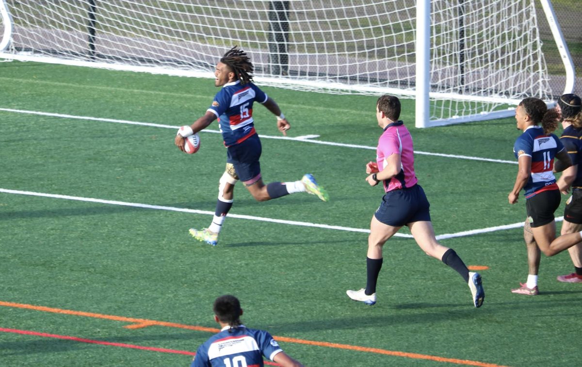 Josefa Waqanikalou celebrates after scoring in the Division I AA playoff game against San Jose State on March 23, 2024. (Photo by William Forseth)