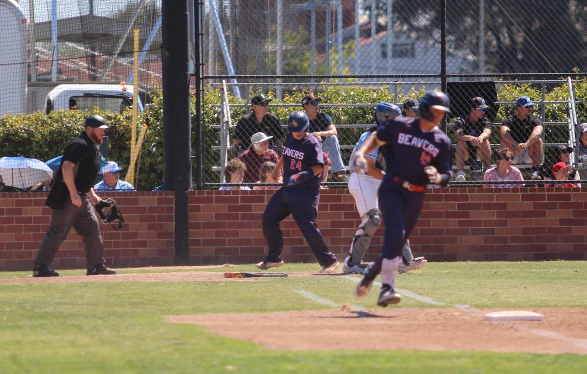 American River College’s left fielder Marcus Babauta hits an RBI single to bring in Nick Golden, ARC’s right fielder, in the team’s 9-4 loss to Modesto Junior College on April 20, 2024. (Photo by Will Forseth)